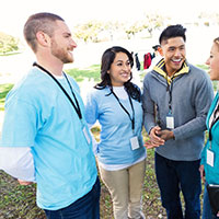 Group of volunteers meeting outside.